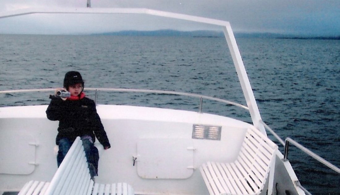 Filippo as a child recording a journey on a boat