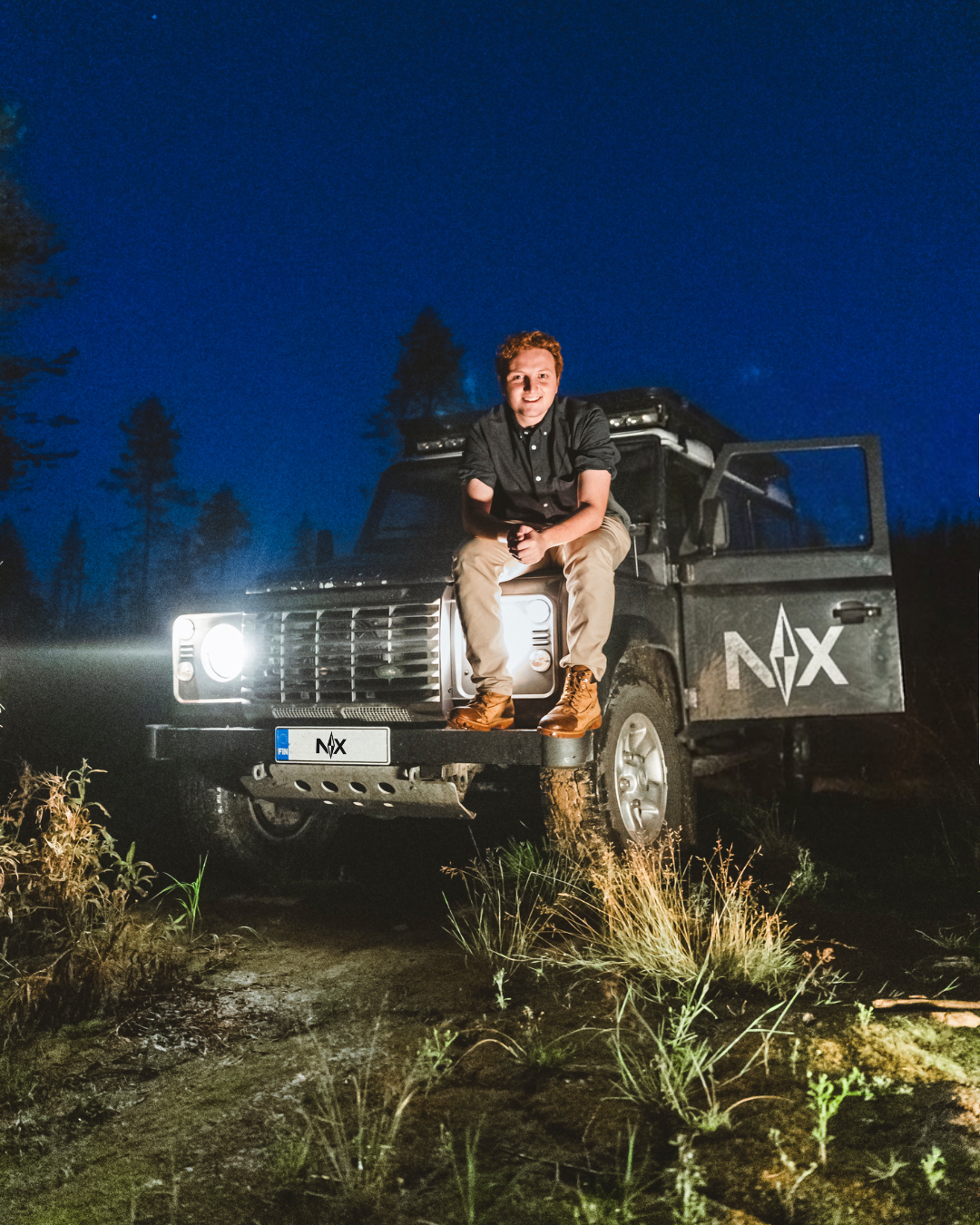 Filippo Dias with the Nordikko NX vehicle at night